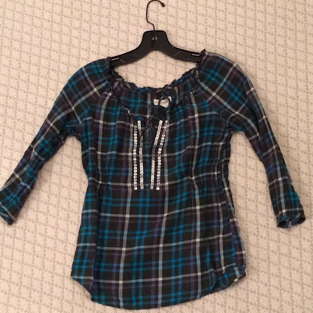 Teal peasant top with sequins and a fitted waist